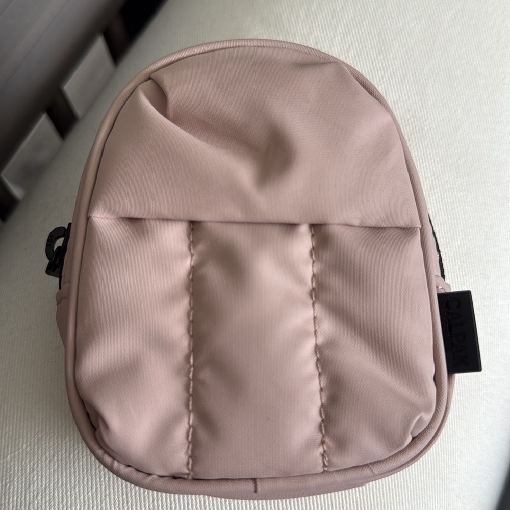 CALPAK Luggage tag tiny backpack.  Rose Quartz